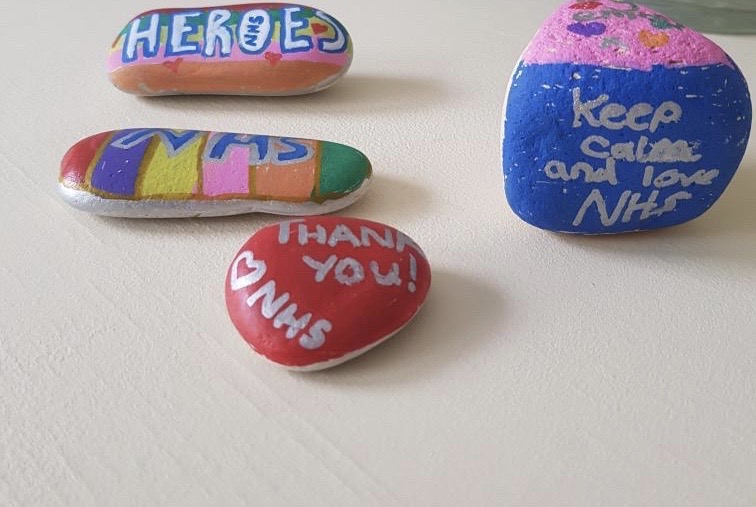 Image of decorated stones sent to the Trust to motivate staff.