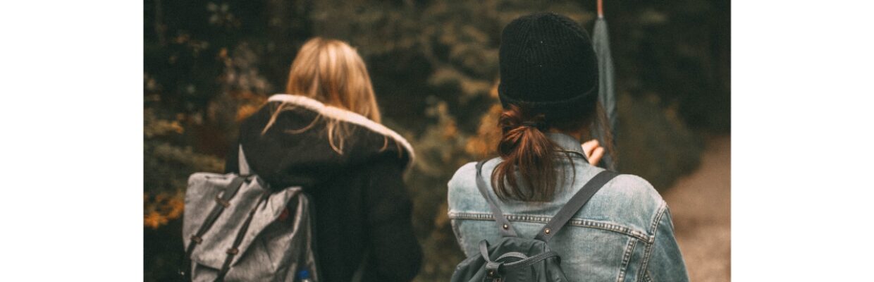 Two people walking.